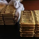 SKN | הזהב נסוג משיאים היסטוריים כאשר מימושי רווחים וציפיות לריבית מעצבים מחדש את סנטימנט השוק